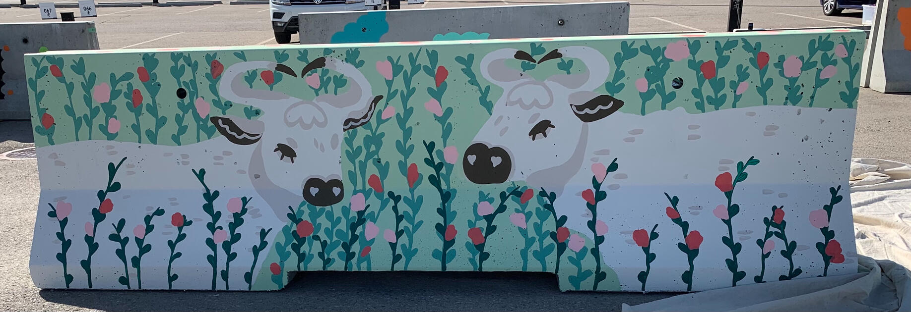 Side of a double sided barrier for BUMP's (Beltline Urban Mural Project) 2021 RoadWorks program